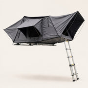 TrailNest Panorama side-fold rooftop tent open on a warm white background