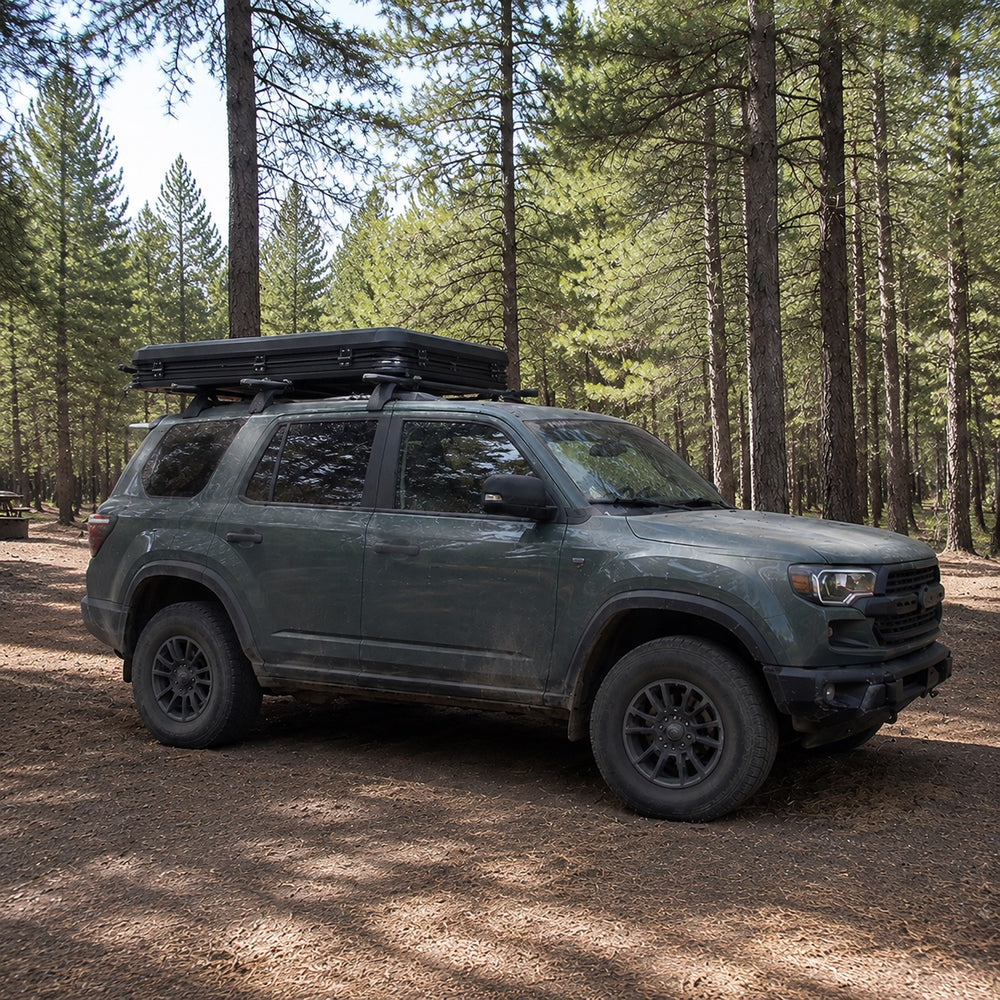 TrailNest Wedge 132 rooftop tent fully closed in its low-profile travel configuration
