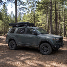 TrailNest Wedge 132 rooftop tent fully closed in its low-profile travel configuration