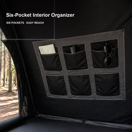 Six-pocket interior organizer inside the TrailNest Wedge 132 rooftop tent