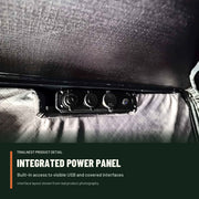 Integrated interior power panel with visible USB and covered interfaces inside the TrailNest rooftop tent