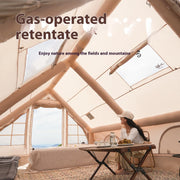 Interior of TrailNest Four-Season Inflatable Cabin Tent with inflatable beams and a table