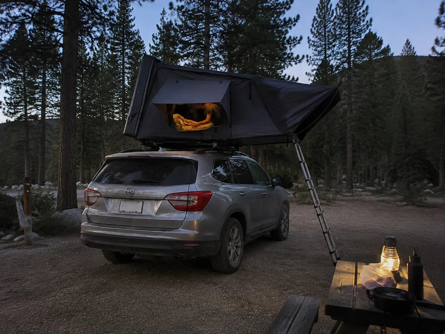 TrailNest Panorama After the last light rear-quarter AI scene concept