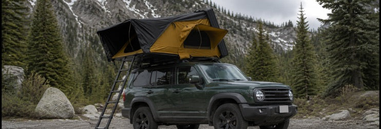 Side-opening aluminum rooftop tent in an alpine setting