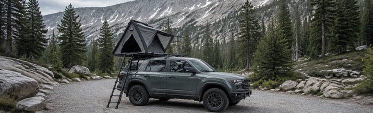 Wedge 132 hard-shell rooftop tent in an alpine setting