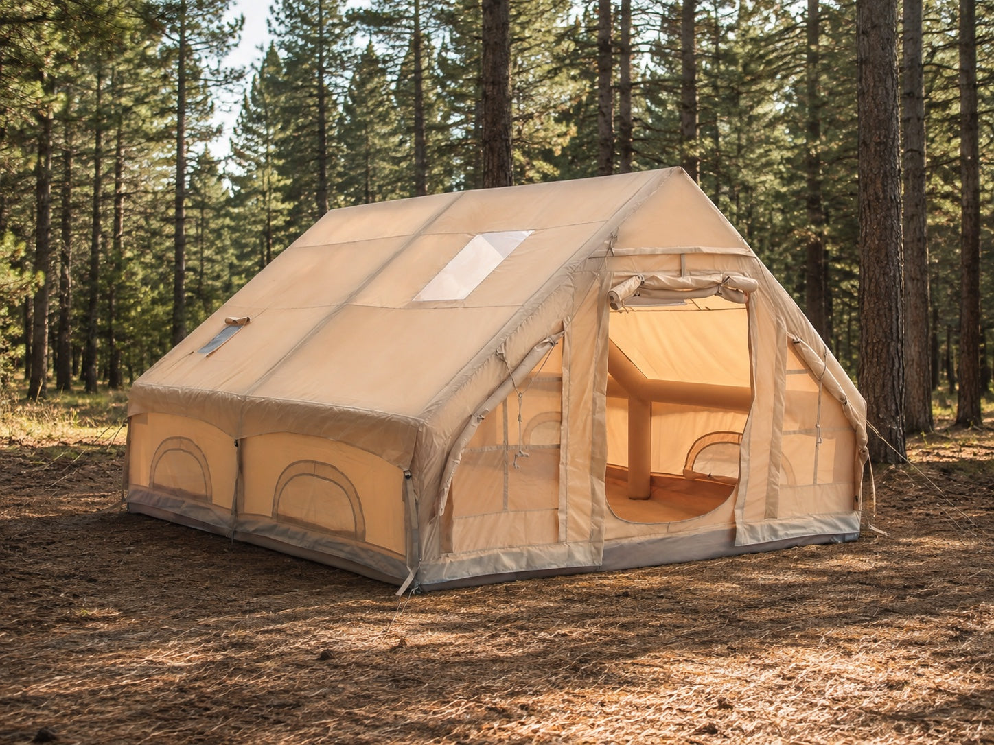 TrailNest Four-Season Inflatable Cabin Tent fully pitched at a North American pine-forest campsite.